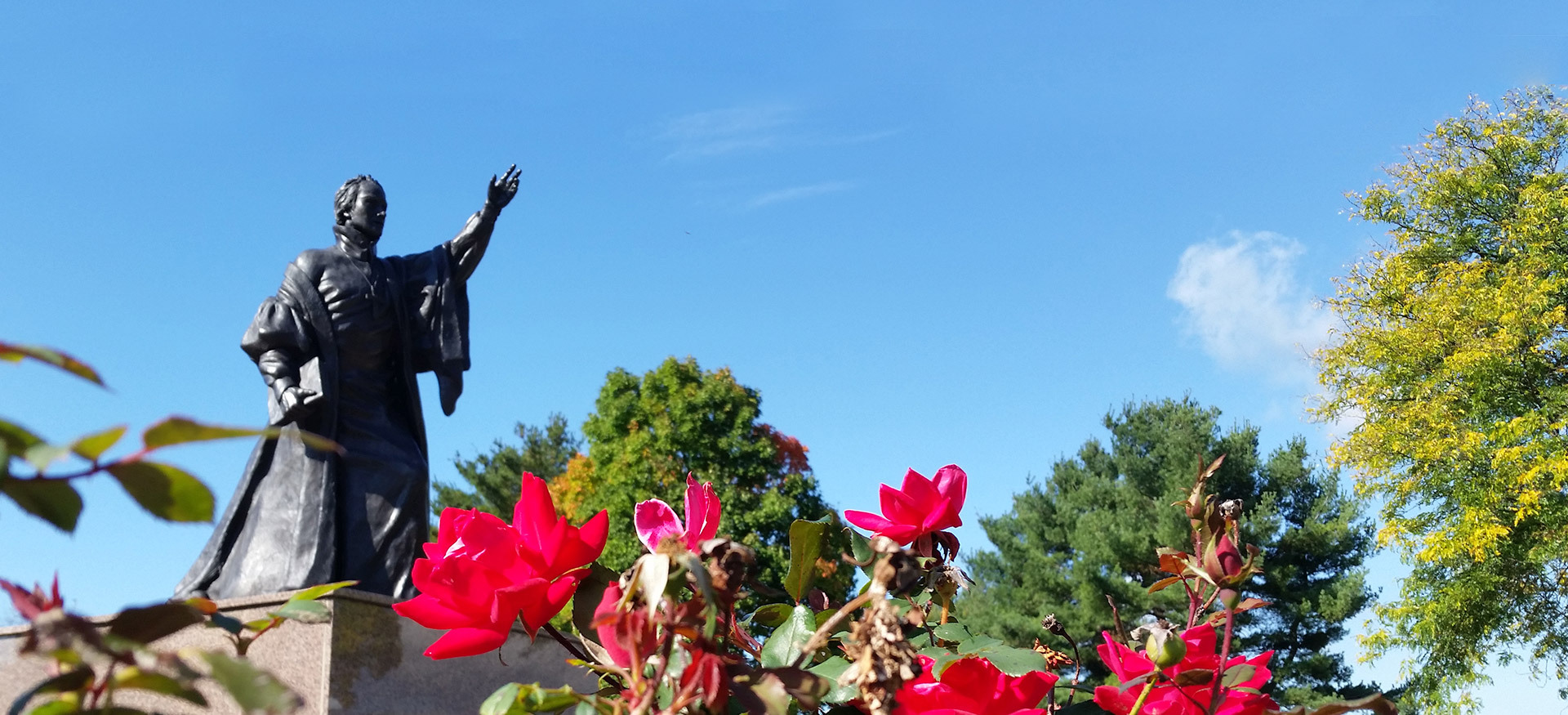 StFrancis-Statue-Summer-Roses