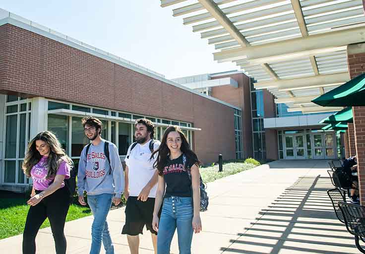 students walking on campus