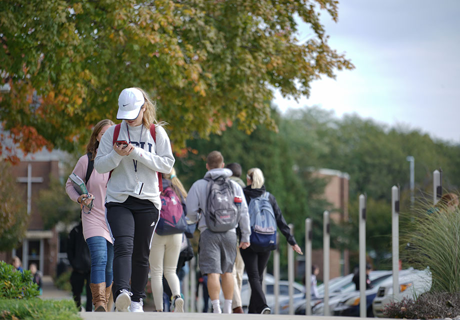 students walking on campus