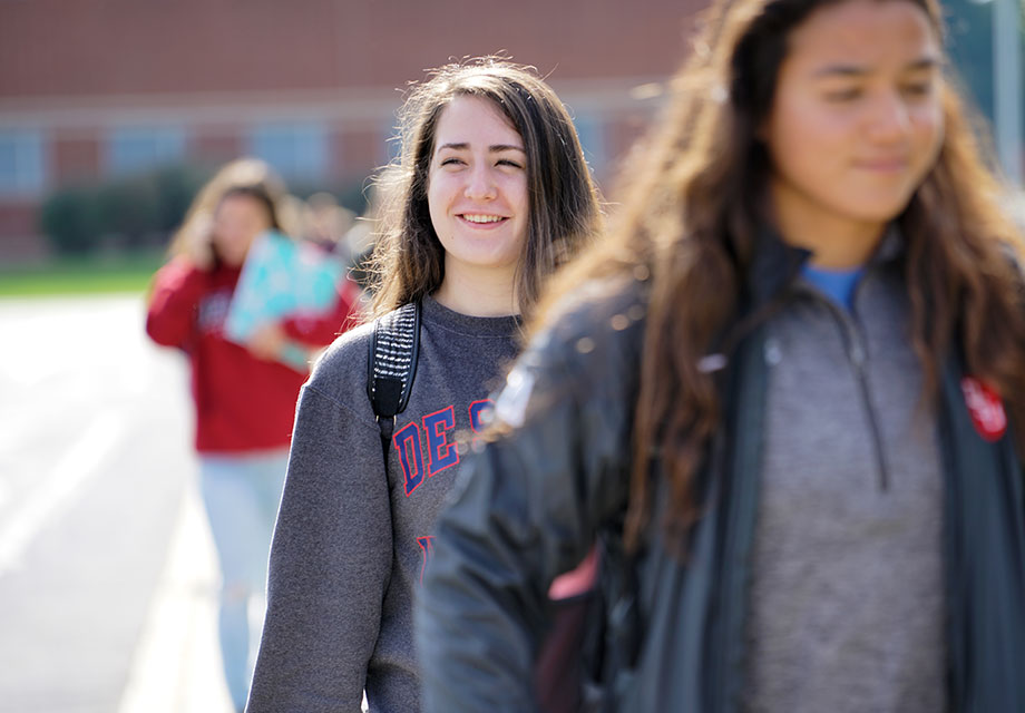 students walking on campus