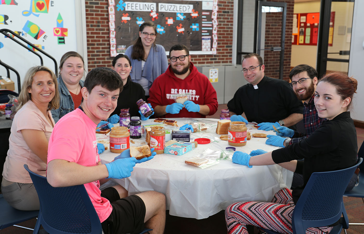 desales community making sandwiches for local shelter