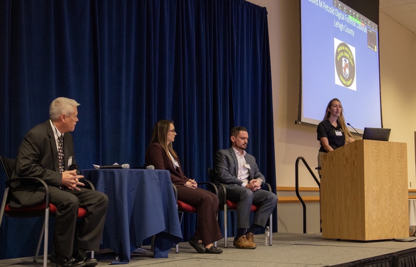 Panelists on stage at 2023 Center for Homeland Security Conference: Applying Digital Forensics in Homeland Security