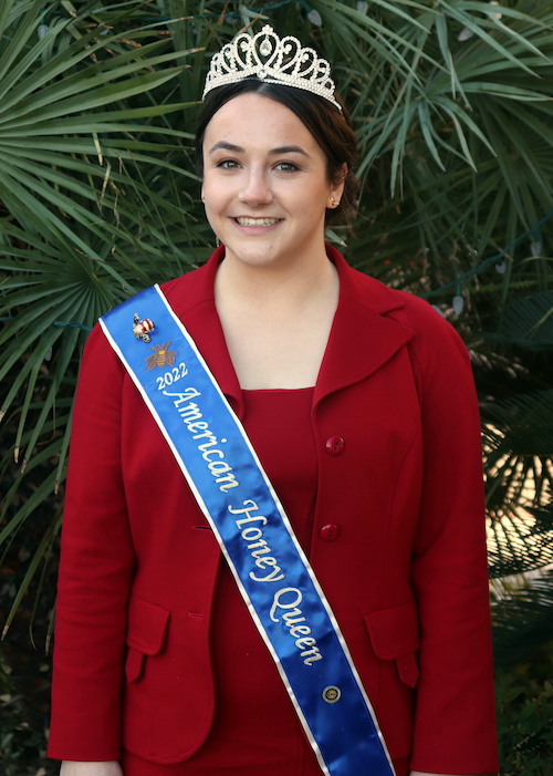 Lucy Winn posing in her tiara and sash